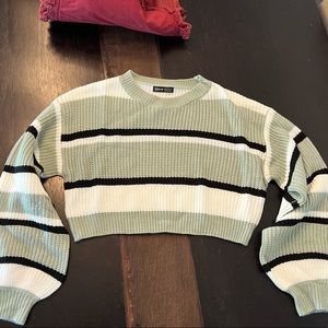 Green, white, and black knitted crop top